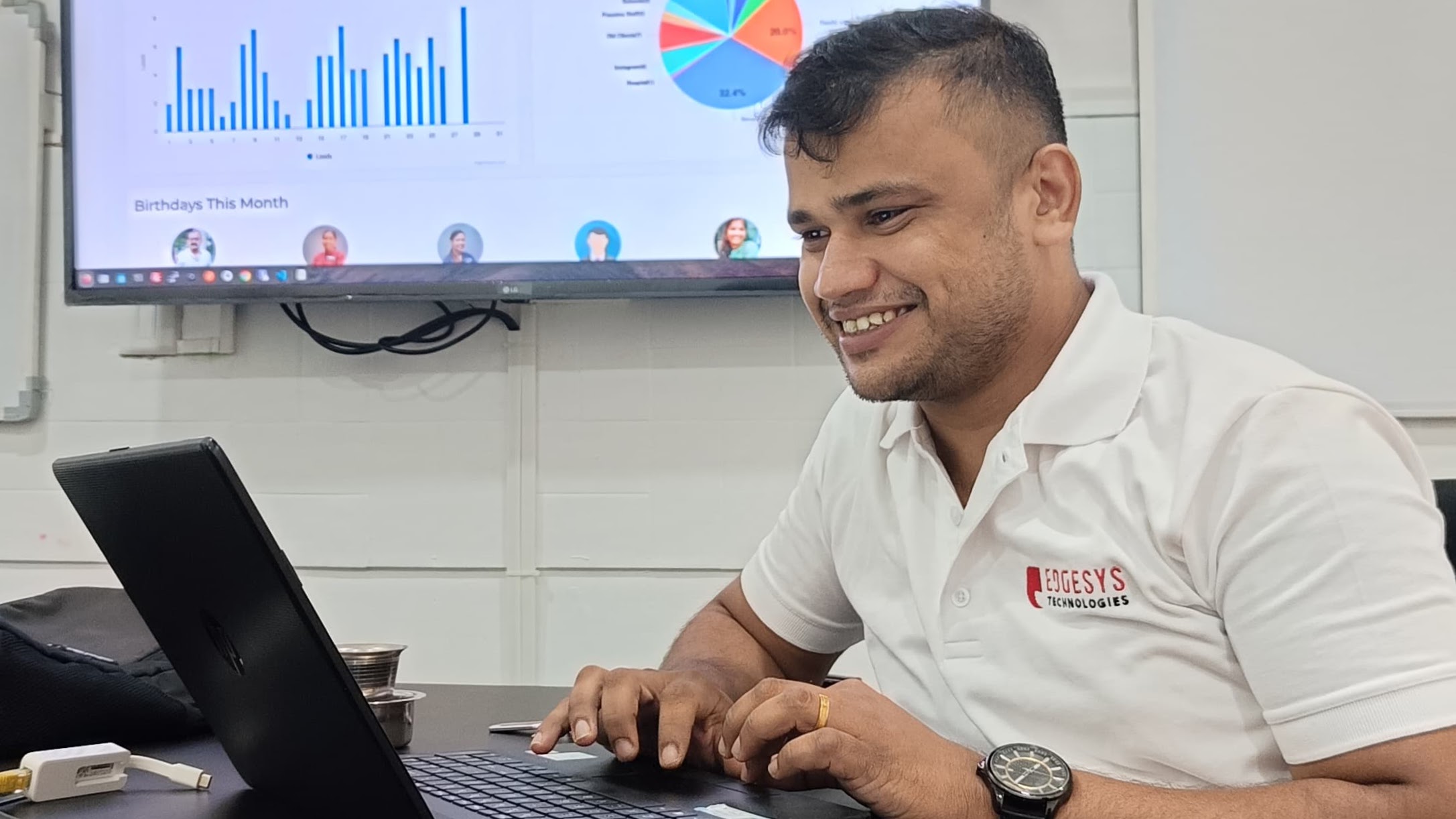 Abin Antony, freelance web developer in Kochi, Kerala, working on a project at his laptop